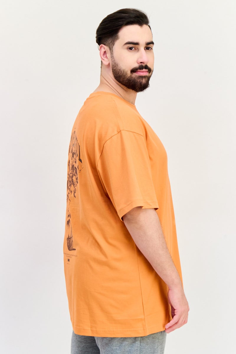 PUMA Men Relaxed Fit Graphic Print Short Sleeves Outdoor T-Shirt, Orange  - Image 2