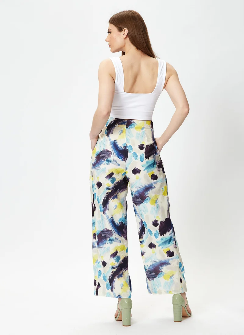 Liquorish  Multicolour Abstract Print Trousers for Women | Best Price UAE