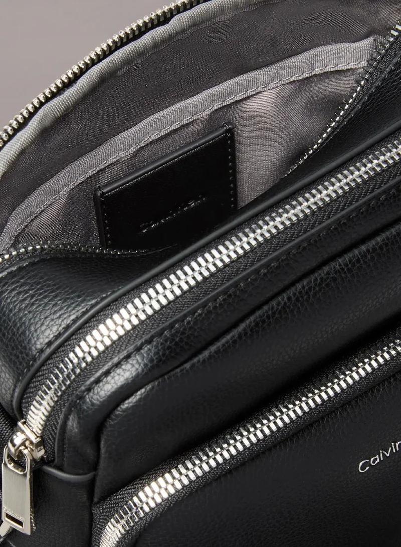 Calvin Klein Black Textured Logo Crossbody Reporter Bag for Men | Best Price UAE