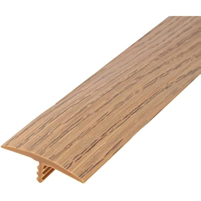 PLASTIC T-MOLDING 1-1/4 INCH NATURAL OAK WOODGRAIN FLEXIBLE POLYETHYLENE CENTER BARB TEE MOULDING 25 FOOT COIL - Image 1