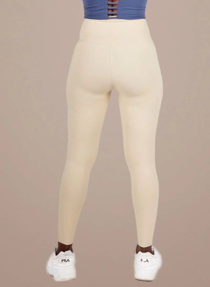 THUGFIT light beige THUGFIT FlexFit Pro High-performance leggings - Apricot for Women | Best Price UAE
