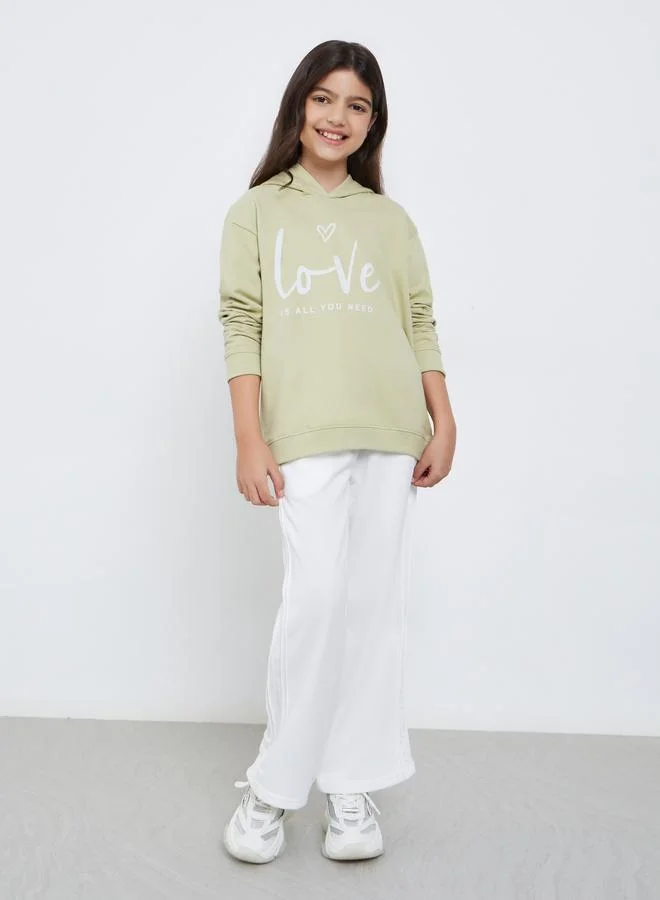 ستايلي هودي بقصة مريحة بطبعة جرافيك