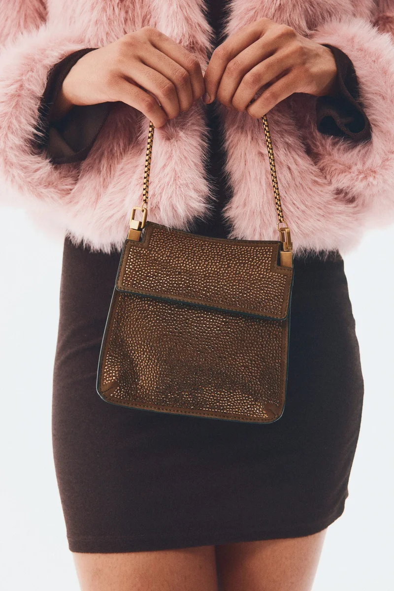 اتش اند ام حقيبة كلاتش مُزينة