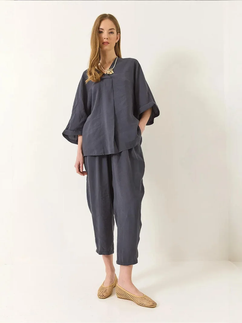 بيانكو لوتشي طقم لوكسي قطعتين بياقة على شكل حرف  وجيوب