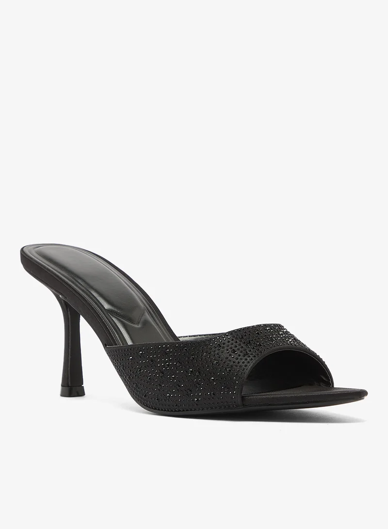 ترافل من نمشي صنادل بكعب عالٍ مزينة بالكريستال بتفاصيل دقيقة