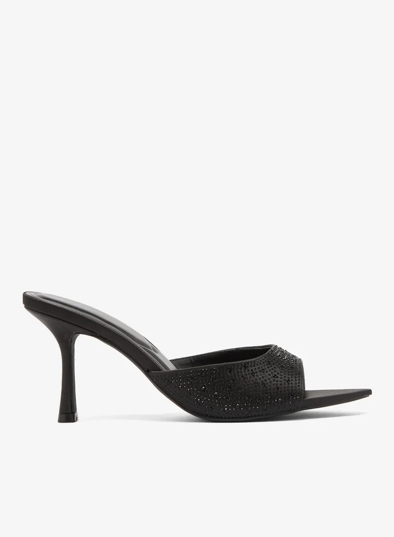 ترافل من نمشي صنادل بكعب عالٍ مزينة بالكريستال بتفاصيل دقيقة