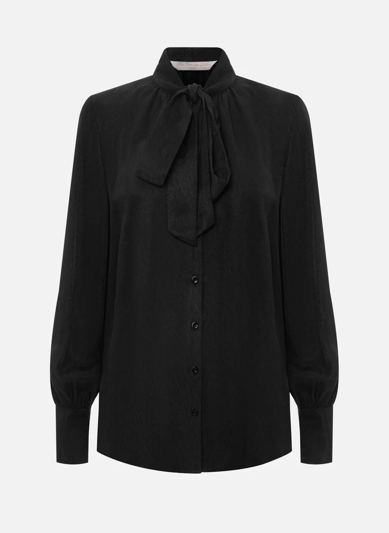 ليتشي بلوزة فضفاضة مع شرائط على الياقة