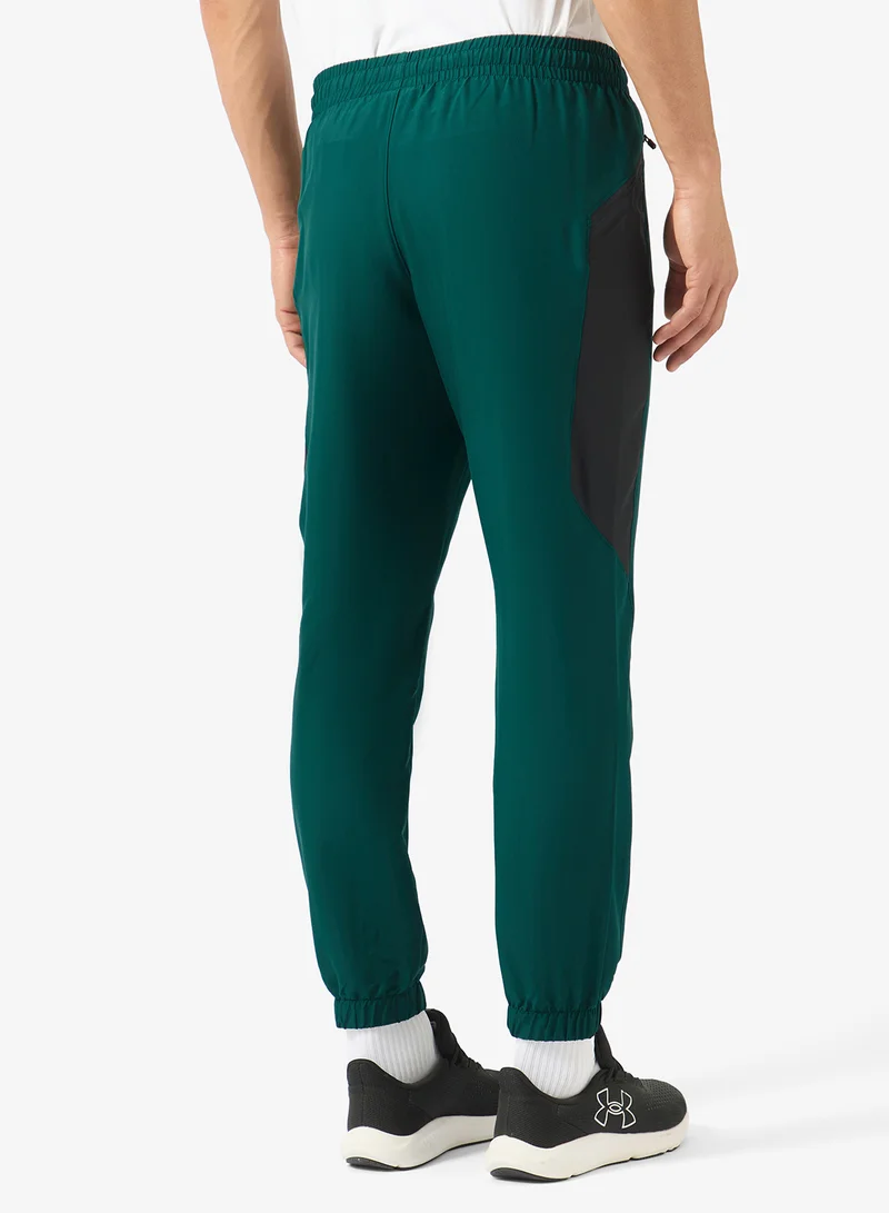 Under Armour Arden Green / Black / Black Tech Logo Sweatpants for Men | Best Price UAE