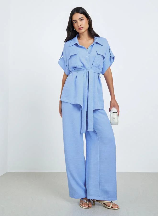 ستايلي طقم منسق من بنطال وقميص بحزام وقصة واسعة