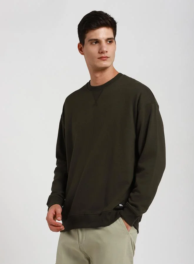 Dennis Lingo Relaxed Fit Solid Sweatshirt with Dropped Shoulder by Styli
