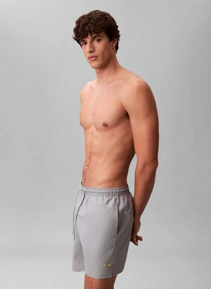 CALVIN KLEIN  Medium Drawstring Swim Shorts for Men | Best Price UAE
