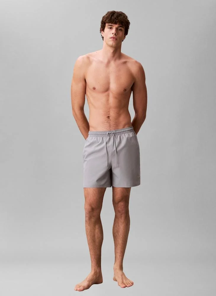 CALVIN KLEIN  Medium Drawstring Swim Shorts for Men | Best Price UAE