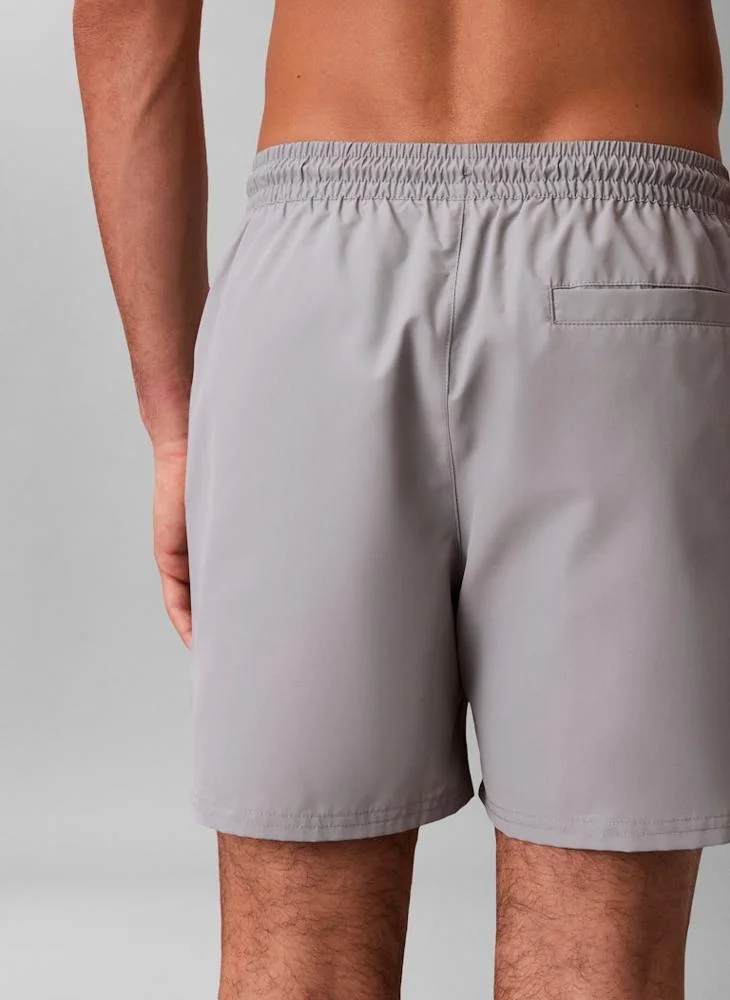 CALVIN KLEIN  Medium Drawstring Swim Shorts for Men | Best Price UAE