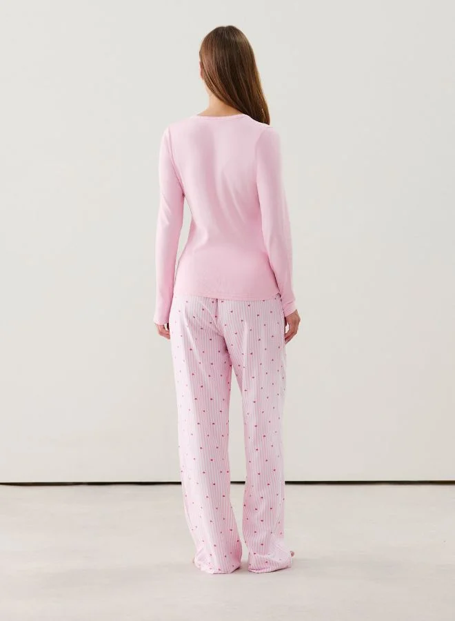 UNDIZ Flannel trousers with stripes and heart patterns