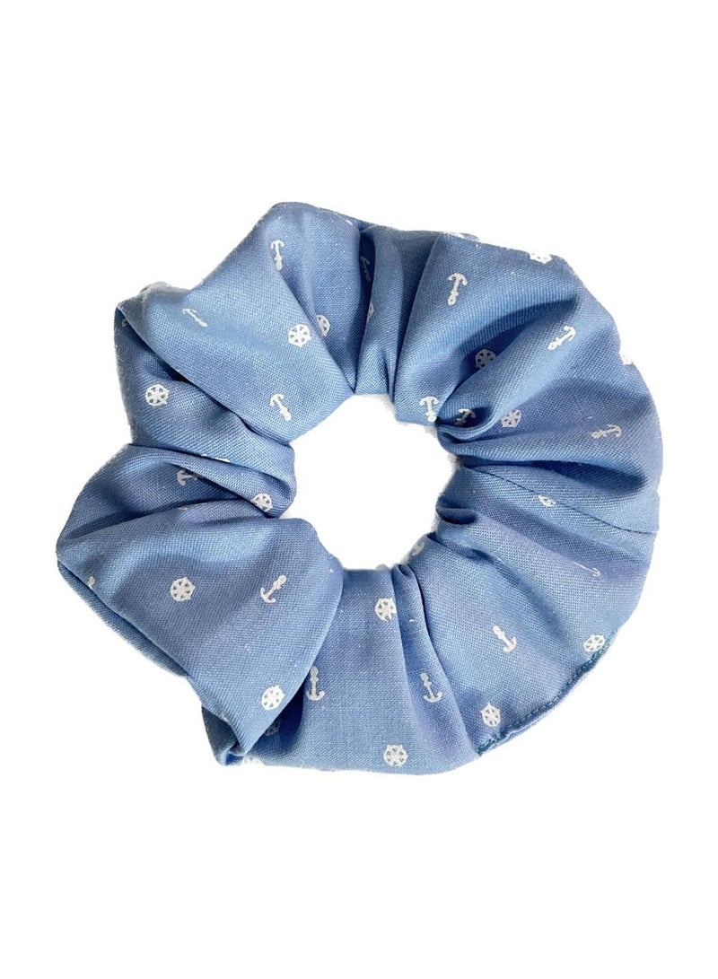 Al Nafis styles denim scrunchies. - Image 1