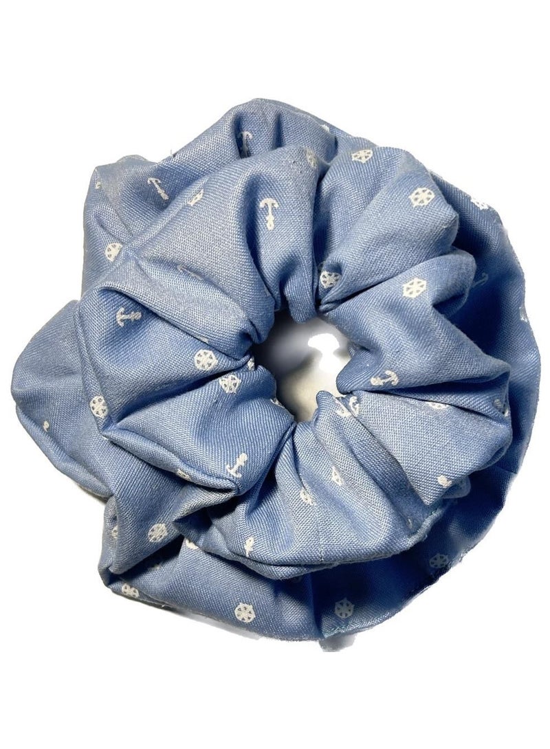 Al Nafis styles denim scrunchies. - Image 2