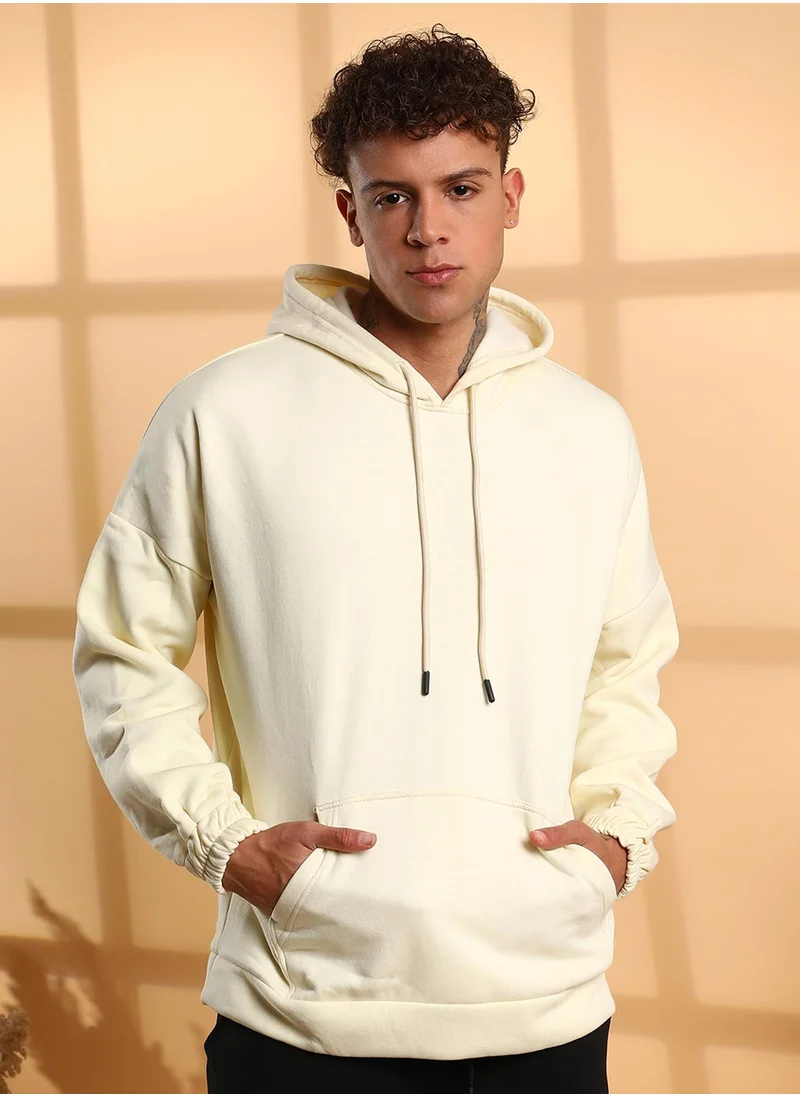Campus Sutra Men's Light Yellow Oversized Pullover Sweatshirt With Kangaroo Pocket