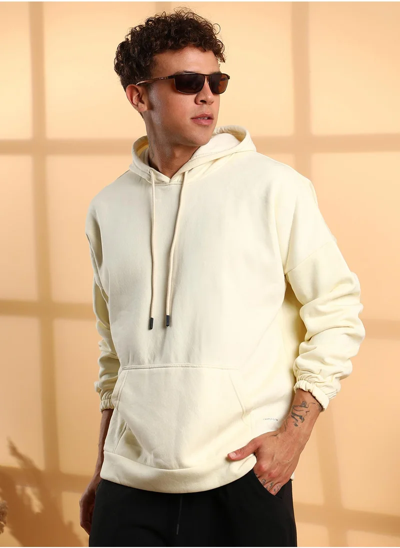 Campus Sutra Men's Light Yellow Oversized Pullover Sweatshirt With Kangaroo Pocket