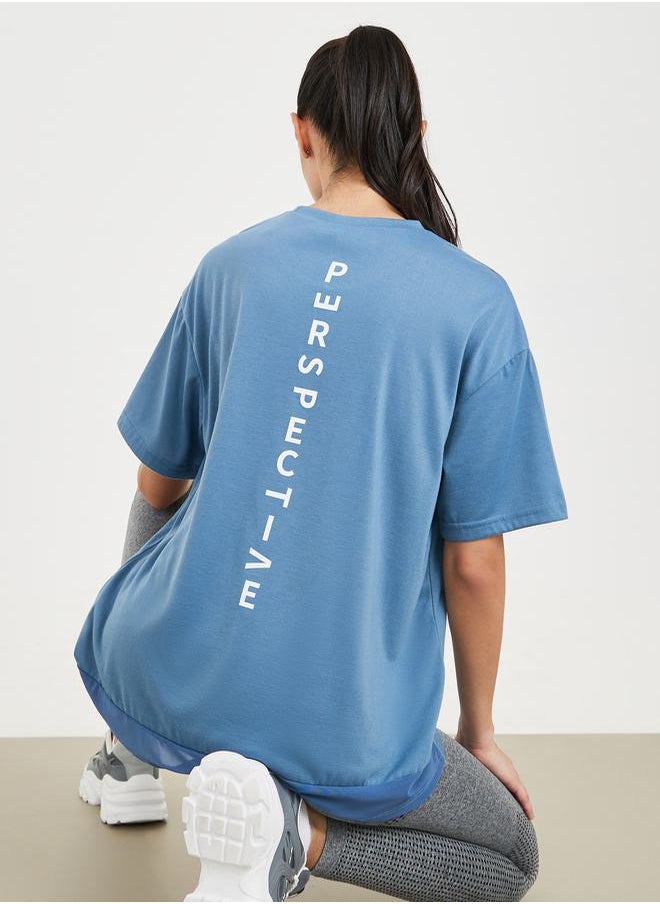 Styli Perspective Back Print Mesh Detail Loose Yoga Fit Top  - Image 1