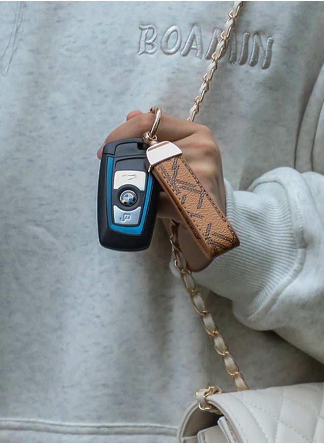 KeyAmor - Elegant metal and leather keychain car key holder for adults. Stylish keychain with golden rings, perfect for women, featuring 3 key rings for added functionality. Made with elegant and refined light brown leather, it offers 360-degree rotation for convenience and comes beautifully packaged in a fancy gift box, making it an excellent accessory or gift choice. - Image 1