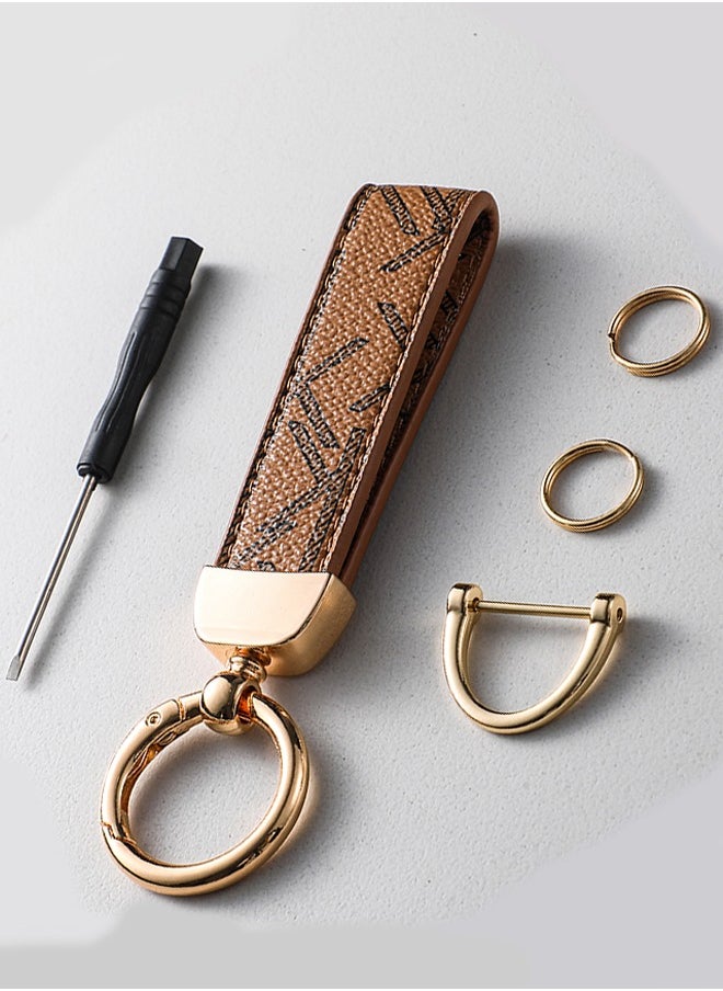 KeyAmor - Elegant metal and leather keychain car key holder for adults. Stylish keychain with golden rings, perfect for women, featuring 3 key rings for added functionality. Made with elegant and refined light brown leather, it offers 360-degree rotation for convenience and comes beautifully packaged in a fancy gift box, making it an excellent accessory or gift choice. - Image 1