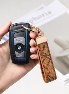 KeyAmor Elegant metal and leather keychain car key holder for adults. Stylish keychain with golden rings, perfect for women, featuring 3 key rings for added functionality. Made with elegant and refined light brown leather, it offers 360-degree rotation for convenience and comes beautifully packaged in a fancy gift box, making it an excellent accessory or gift choice.  - Image 1