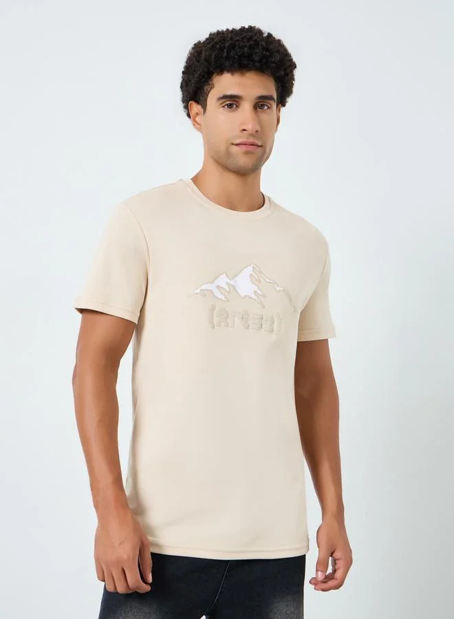 Styli Men Beige Graphic Print Crew Neck T-Shirt