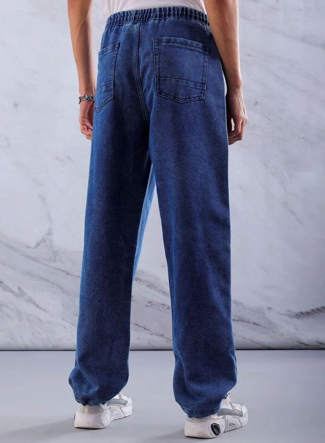 The Indian Garage Co  Men Relaxed Fit Solid Mid-Rise Denim Joggers for Men | Best Price UAE