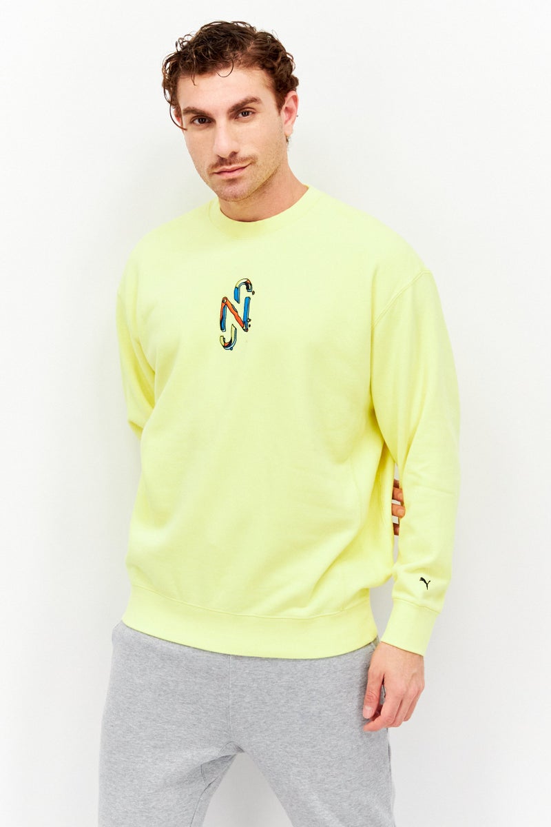 PUMA Puma x NJR Men Sportswear Fit Embroidered Logo Walking Sweatshirts, Yellow  - Image 1