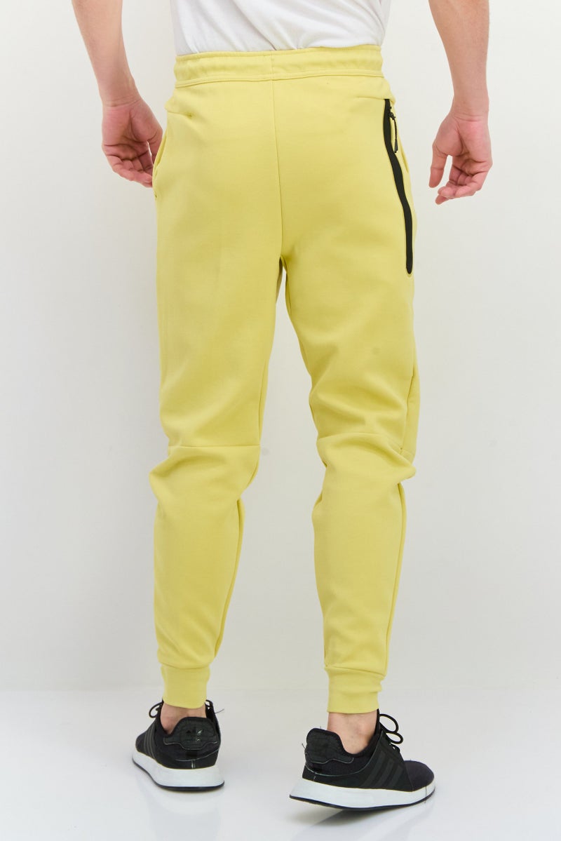 Nike Men Slim Fit Taper Leg Regular Length Training Sweatpants, Yellow  - Image 3