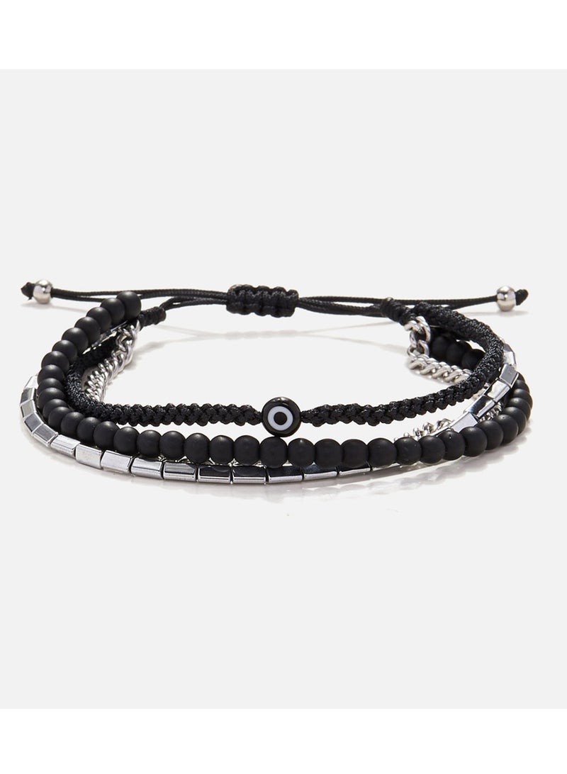 CHRYSOSTOMOS Handmade Adjustable Beaded Multi-Line Bracelet with Onyx Stones, Triangular Hematite Tube and Black Glass Eye - Image 1