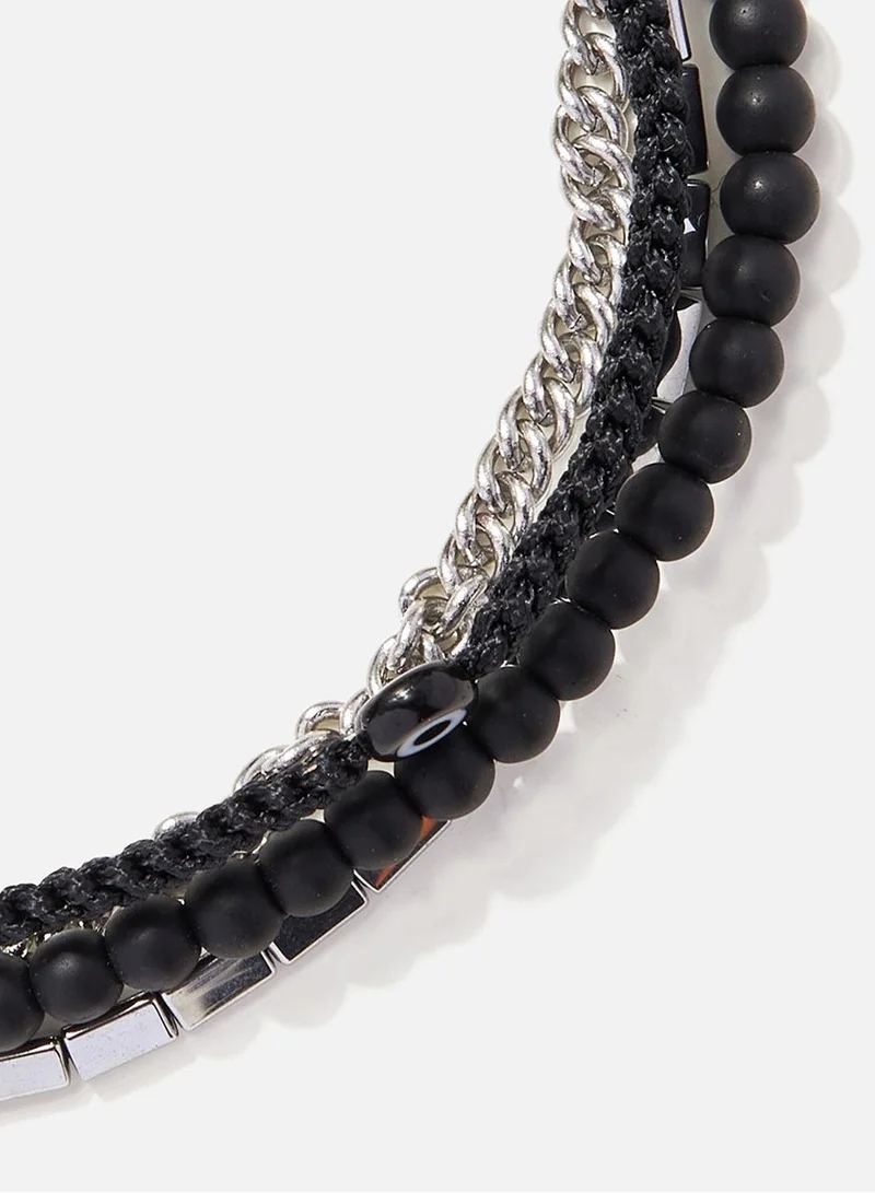CHRYSOSTOMOS Handmade Adjustable Beaded Multi-Line Bracelet with Onyx Stones, Triangular Hematite Tube and Black Glass Eye