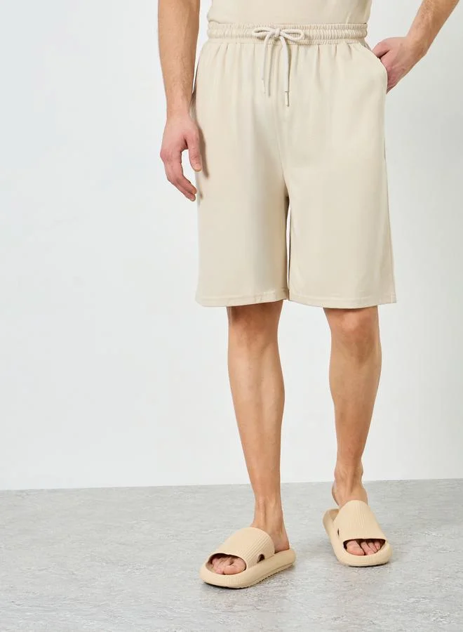 Styli  Men Beige Relaxed Fit Tank and Shorts Pyjama Set for Men | Best Price UAE