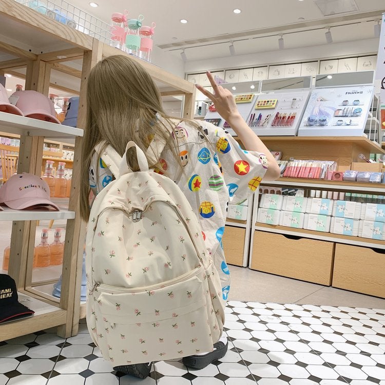 Backpack female junior high school student Japanese style fresh floral schoolbag high school student South Korea ins Harajuku college style backpack Small flower 