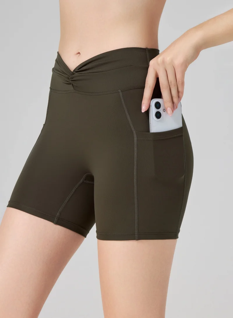 AMORXE AMORXE Women’s High Waisted Yoga Shorts – Twist Waistband, Tummy Control Workout Shorts with Side Pockets for Gym Fitness Running – XLarge, Olive Green