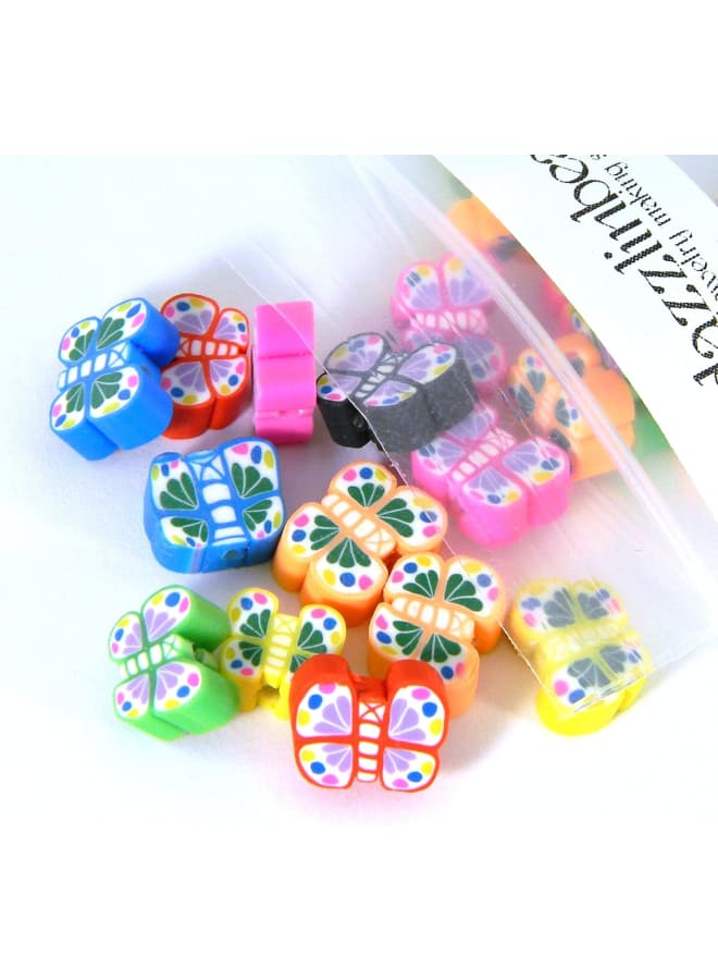 High quality handmade butterfly polymer clay beads in an of different colors and sizes. They measure 6-9mm in tall and 4-4.5mm thick with 1-1.2mm holes. The holes run from the top of the butterfly through to the bottom. Since these beads are handmade they all vary slightly. age of 30 beads. - Image 2