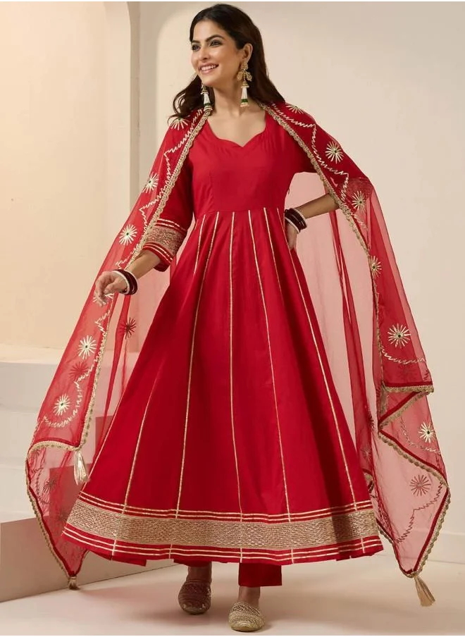 ISHIN Palazzo Women Red Cotton Kurta Set with Embroidered pattern Tunic and Palazzo features a Round neckline and Three-Fourth Sleeve secured with Elastic closure and styled in Straight Fit ideal for Festive moments — exude elegance in every glance.