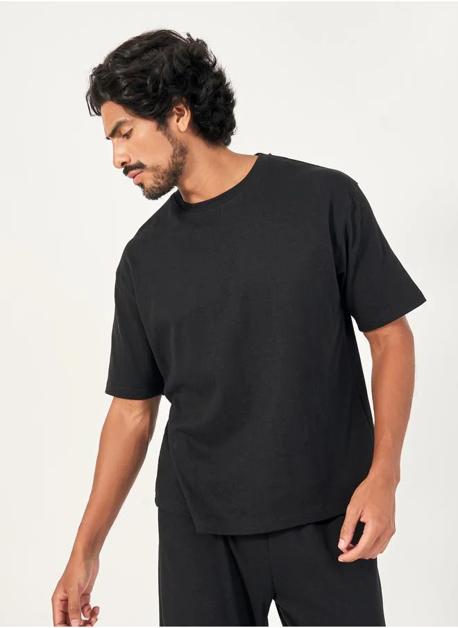 Styli Back Print Oversized T-Shirt & Open Hem Interlock Joggers Co-Ords