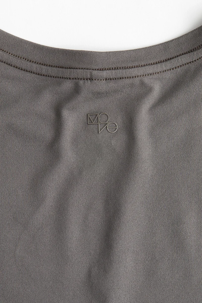 اتش اند ام بلوزة رياضية من قماش دراي موف