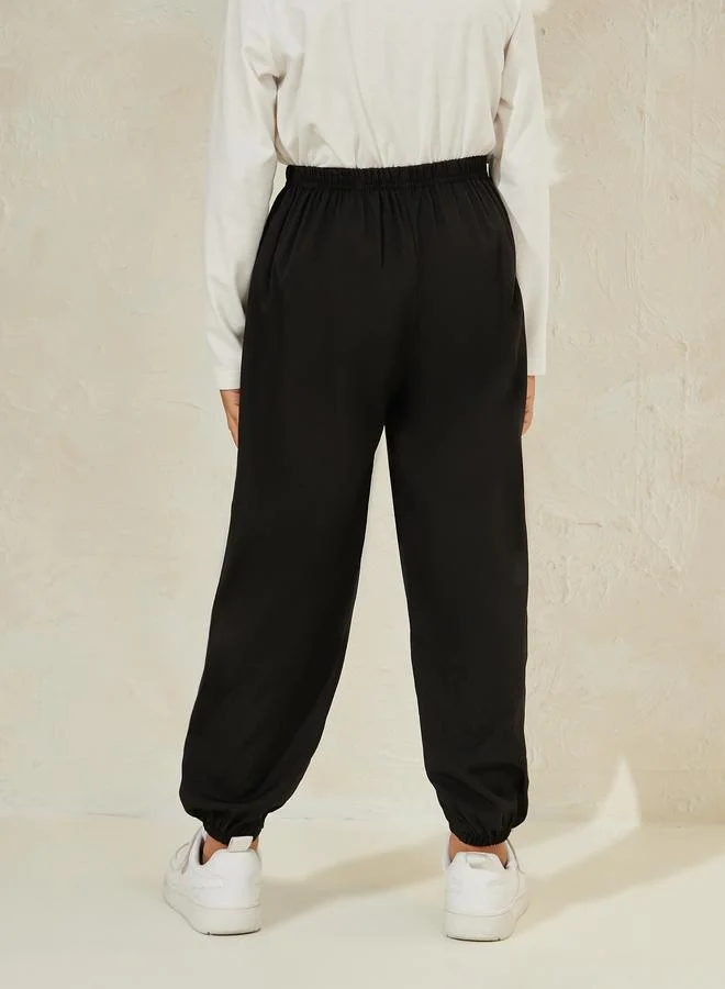 Styli Slogan Print Pipe Detailing Joggers