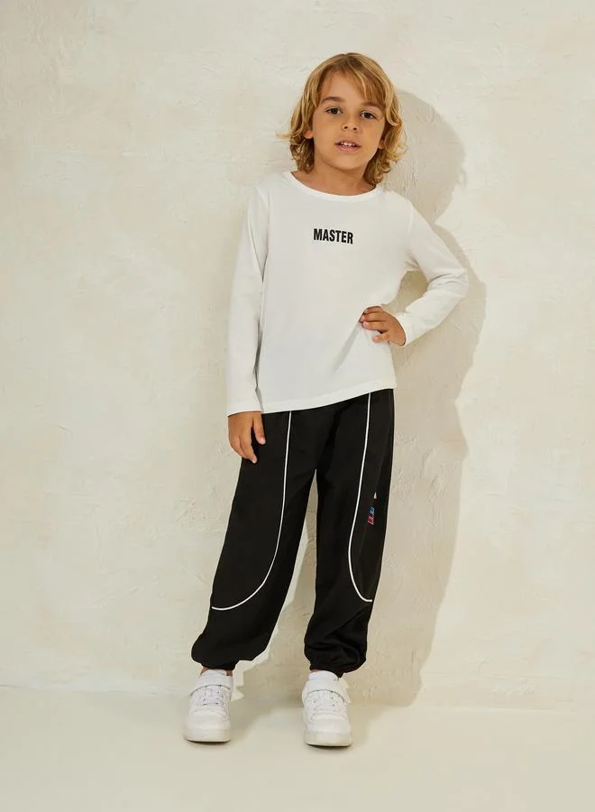 Styli Slogan Print Pipe Detailing Joggers