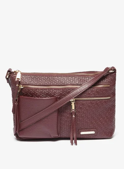 سيليست Women All-Over Monogram Embossed Crossbody Bag with Adjustable Strap and Zip Closure