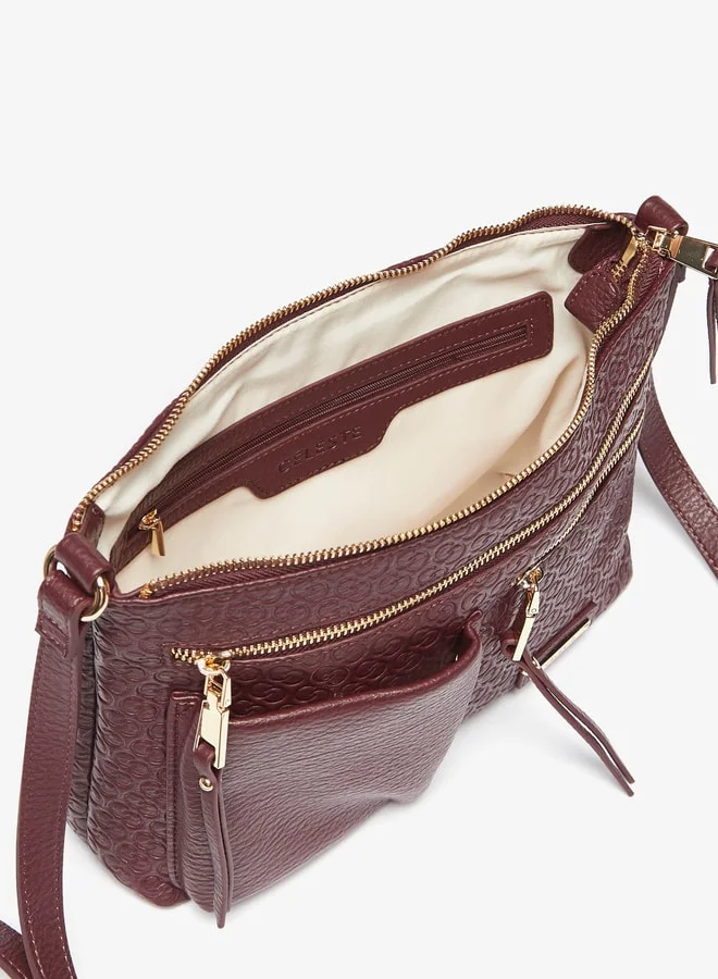 سيليست Women All-Over Monogram Embossed Crossbody Bag with Adjustable Strap and Zip Closure