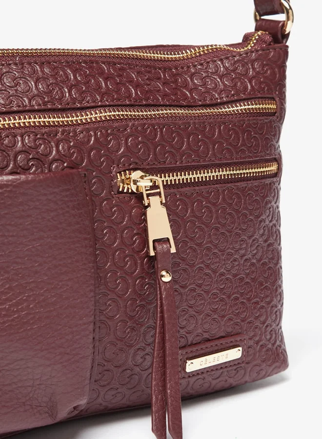 سيليست Women All-Over Monogram Embossed Crossbody Bag with Adjustable Strap and Zip Closure