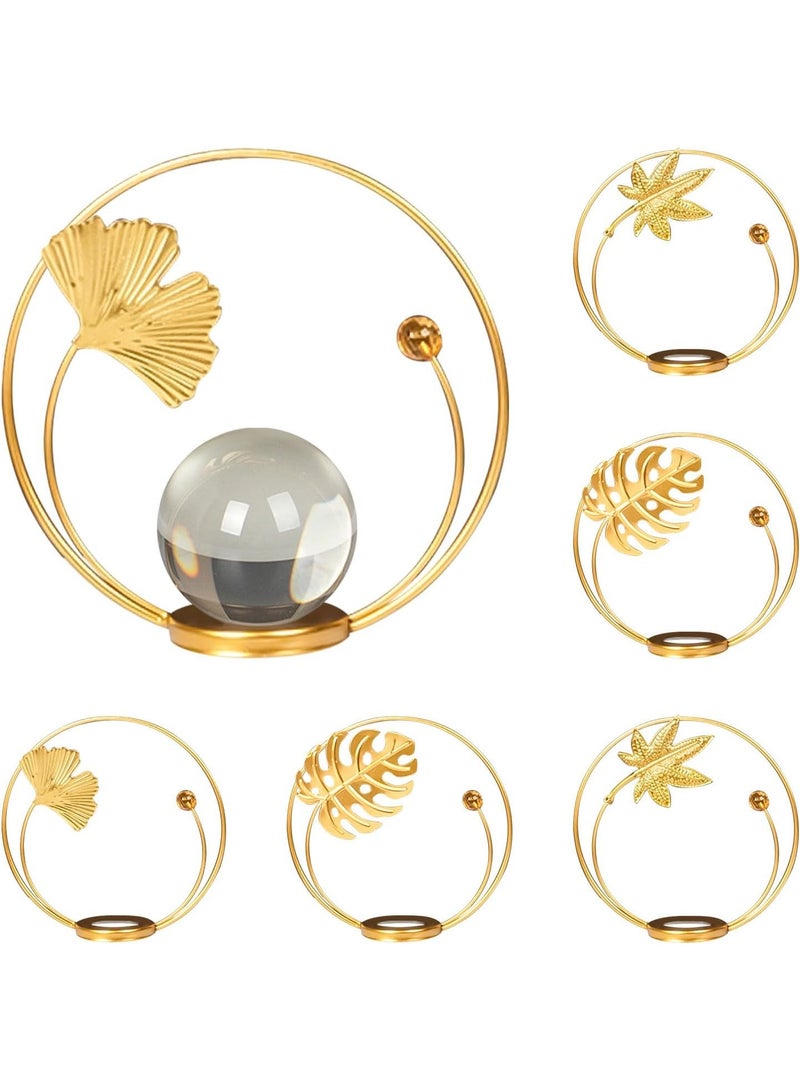 A decorative gold metal ornament with a circular design featuring a leaf and a clear crystal ball - a modern and elegant decoration for tables and shelves. - Image 5