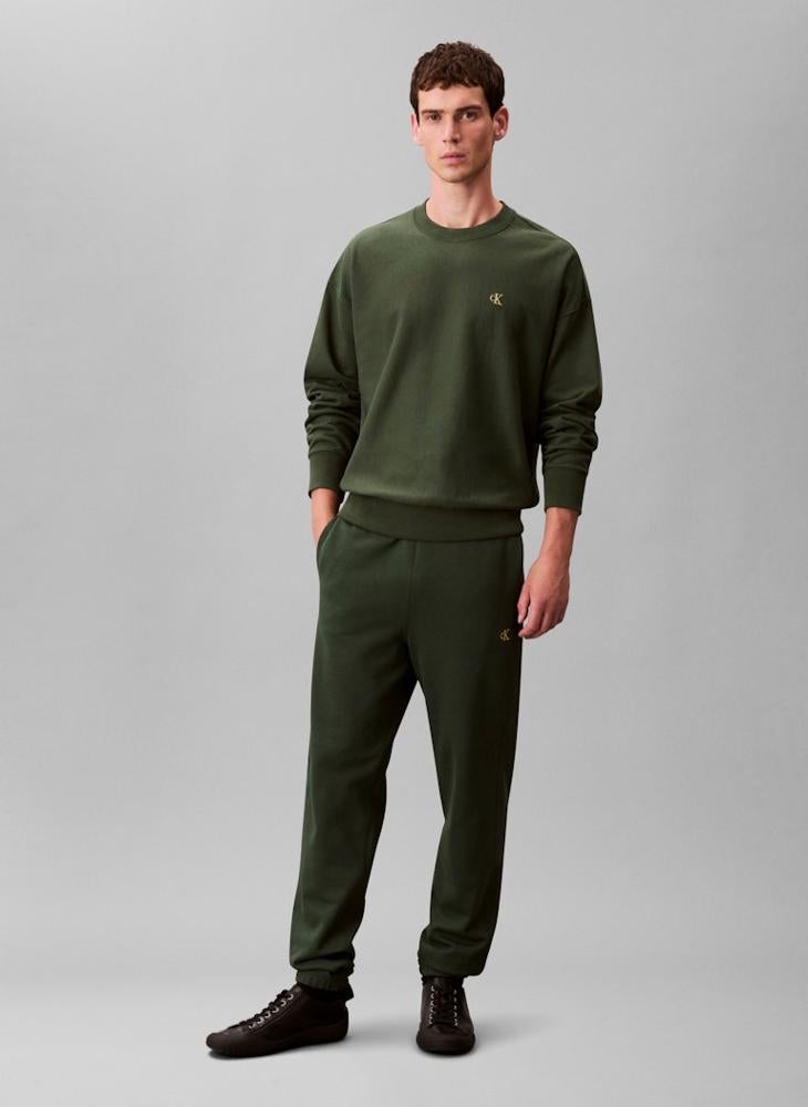 كالفن كلاين جينز سروال تيري مطبوع بشعار - Image 1