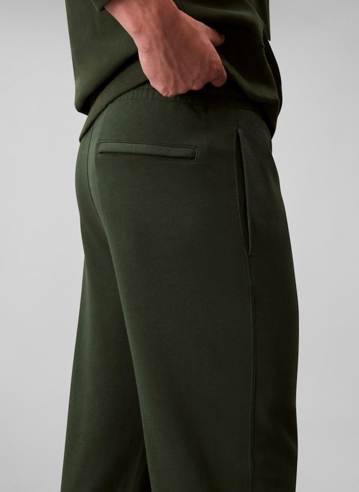 كالفن كلاين جينز سروال تيري مطبوع بشعار - Image 4