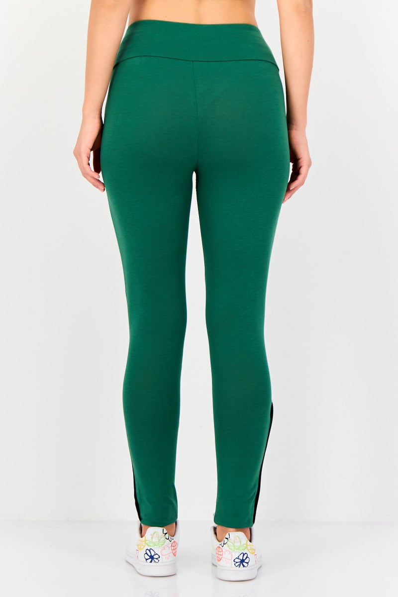 PUMA Women Tight Fit Brand Logo Training Leggings, Green - Image 4