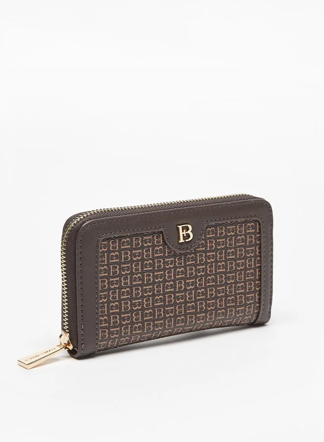 فلورا بيلا من شو إكسبرس All-Over Logo Print Zip Around Wallet
