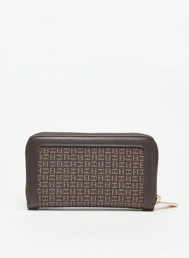 فلورا بيلا من شو إكسبرس All-Over Logo Print Zip Around Wallet